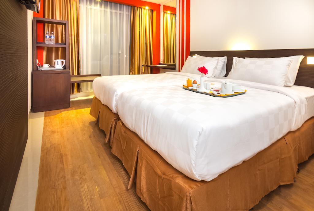 Redstar Hotel Giacarta Camera foto