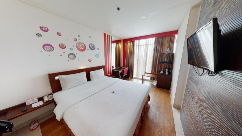 Redstar Hotel Giacarta Esterno foto