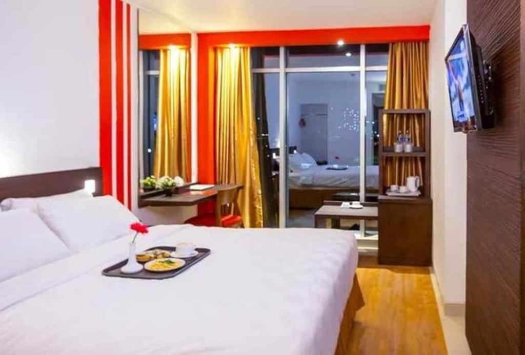 Redstar Hotel Giacarta Esterno foto